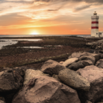 Vista del faro di Garður nella penisola Reykjanes. Scopri i pacchetti vacanze di Elysia Tours: L'Islanda in 8 giorni.
